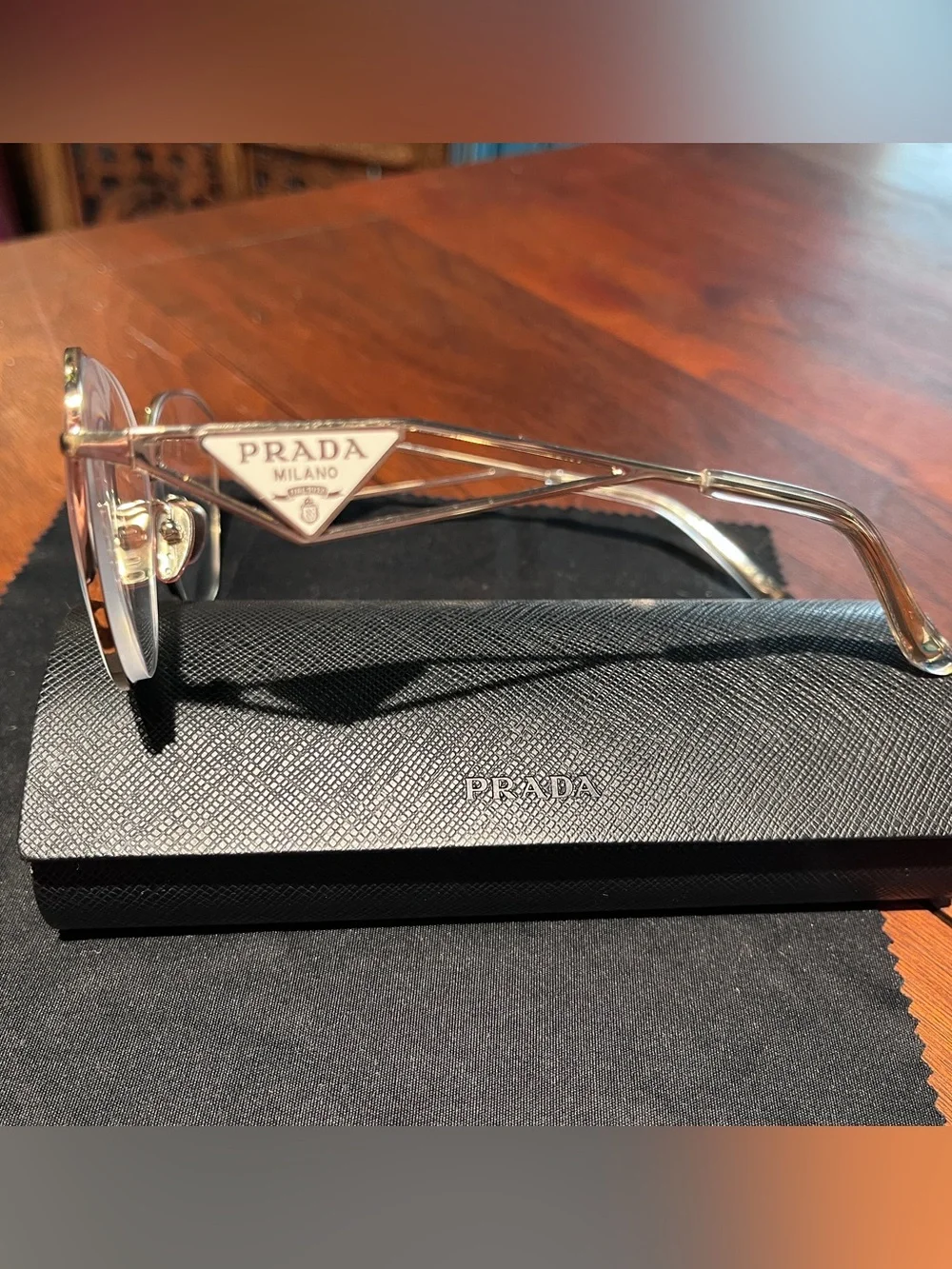 Prada - eyeglass frames - PR 52ZV - pale gold